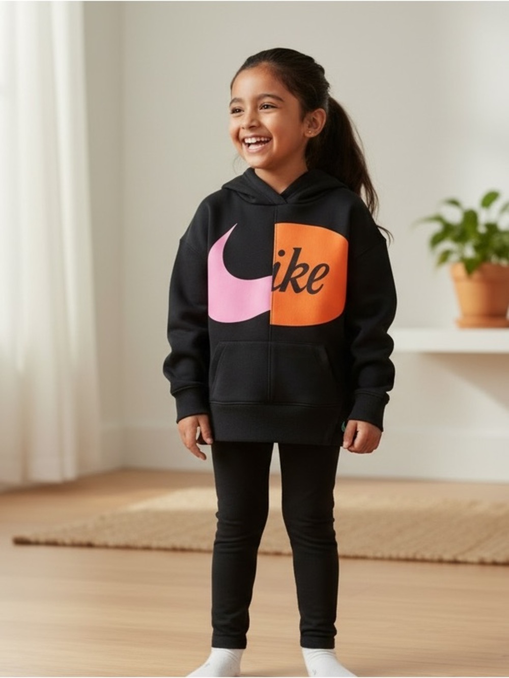 Nike Kids Black Hoodie with Pink and Orange Swoosh Block
